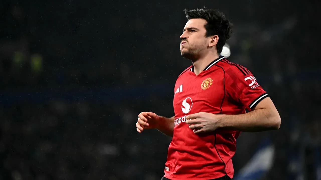 Player celebrating in Manchester United red jersey Player celebrating in Manchester United red jersey