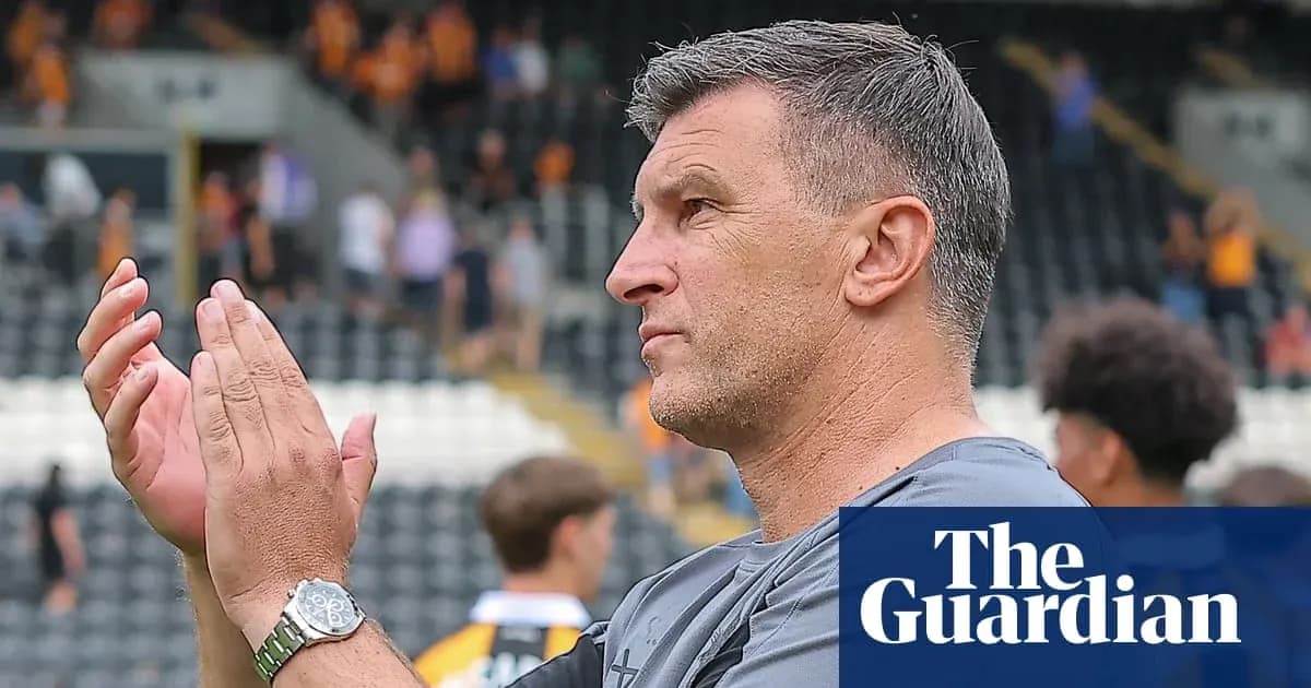 Coach applauding fans in stadium after match Coach applauding fans in stadium after match