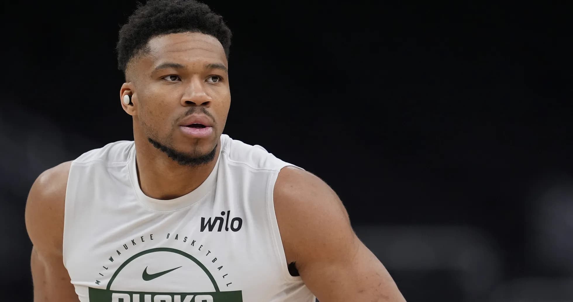 Player in Milwaukee Bucks shirt during warm-up Player in Milwaukee Bucks shirt during warm-up
