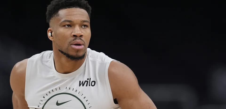 Player in Milwaukee Bucks shirt during warm-up Player in Milwaukee Bucks shirt during warm-up