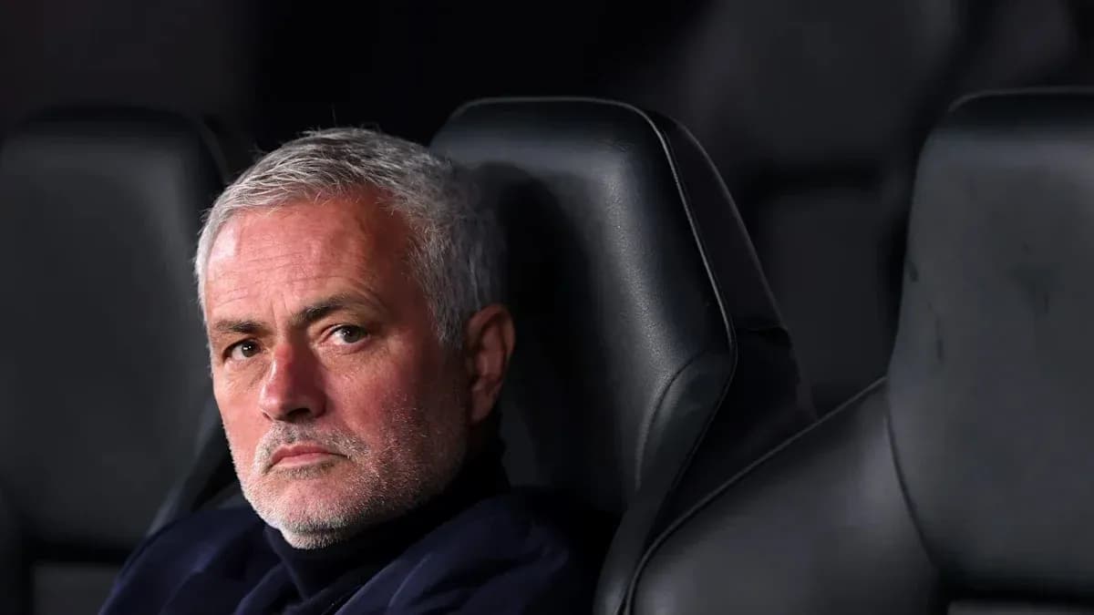 Manager sitting on bench during match Manager sitting on bench during match