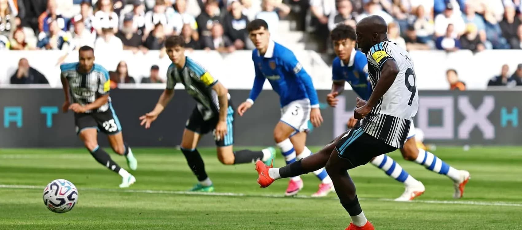 Player taking a penalty kick during match Player taking a penalty kick during match
