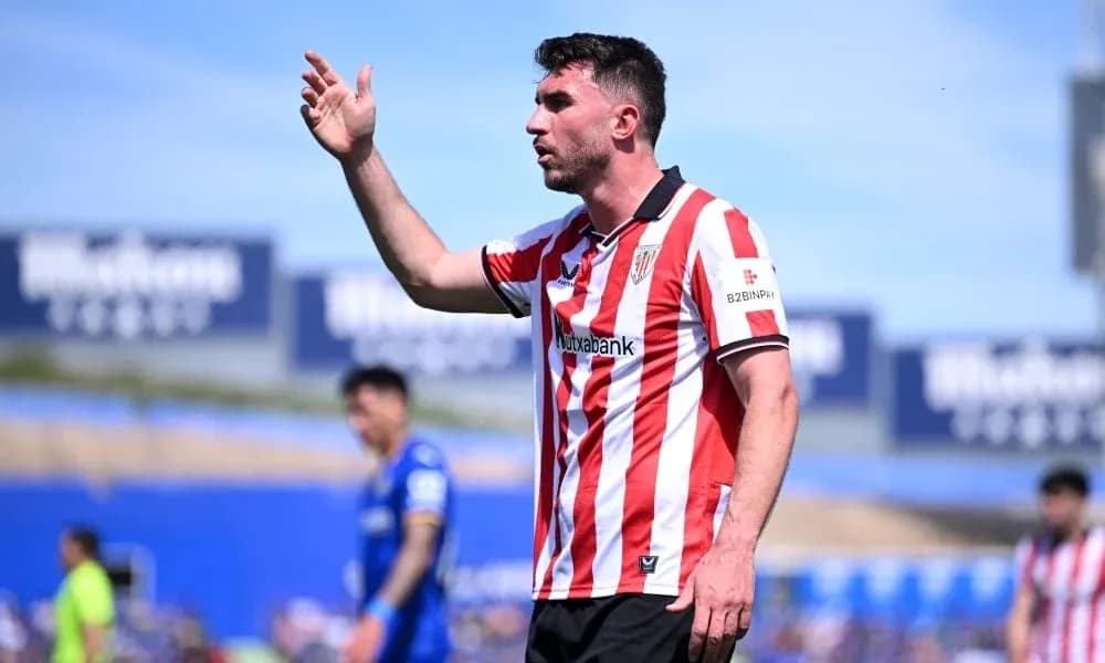 Player gesturing during a football match Player gesturing during a football match