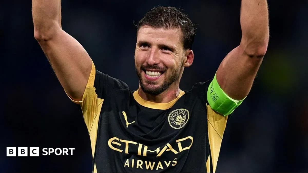 Player celebrating with arms raised after match Player celebrating with arms raised after match