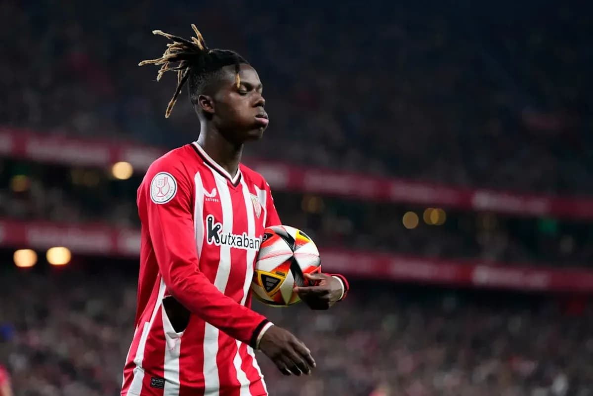 Player holding ball during match at stadium Player holding ball during match at stadium