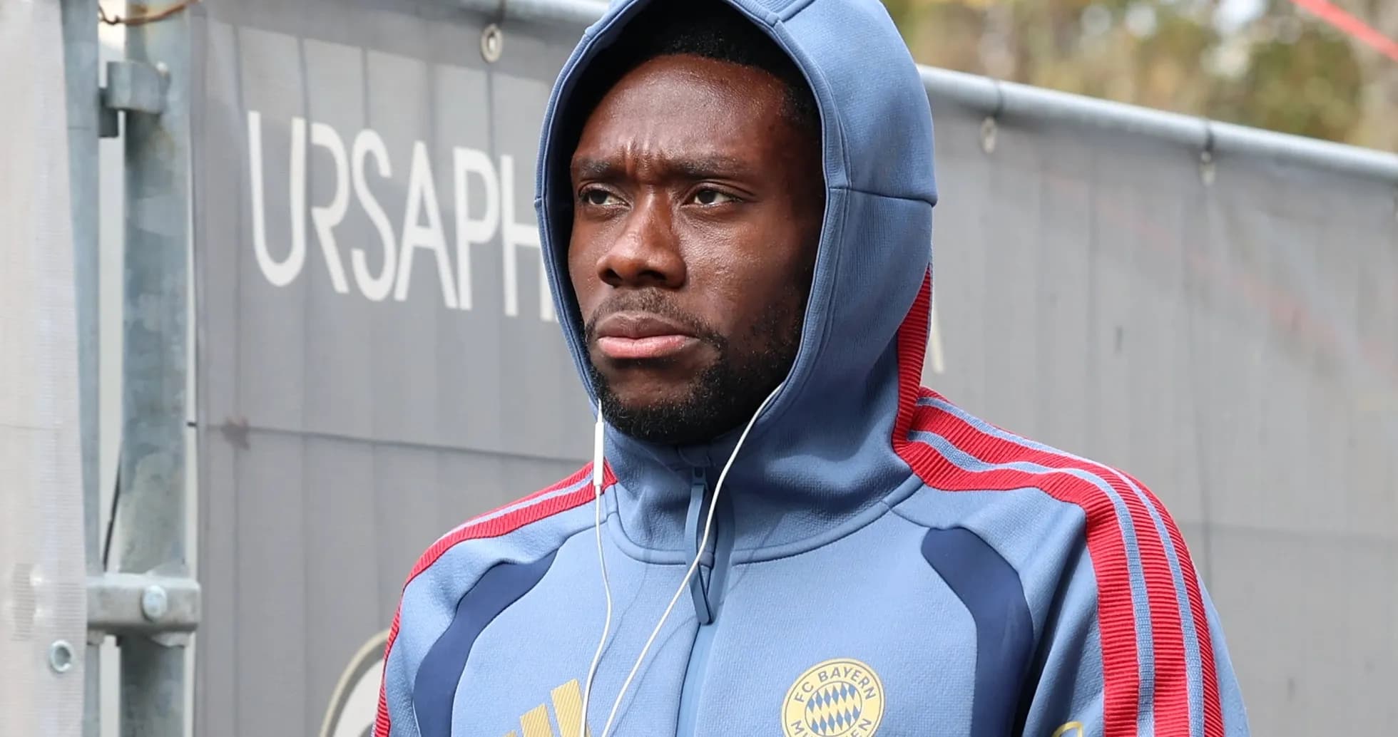 Player wearing Bayern Munich hoodie arriving at training Player wearing Bayern Munich hoodie arriving at training