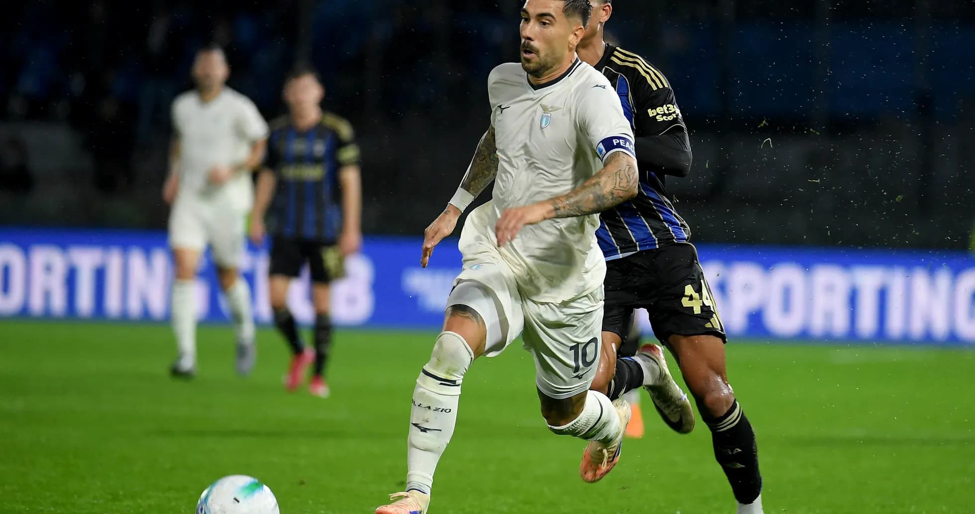 Lazio player sprinting during match against Pisa Lazio player sprinting during match against Pisa