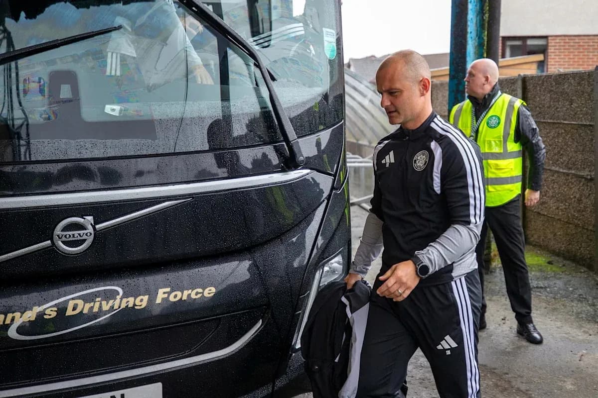 Coach arriving at venue with team staff Coach arriving at venue with team staff
