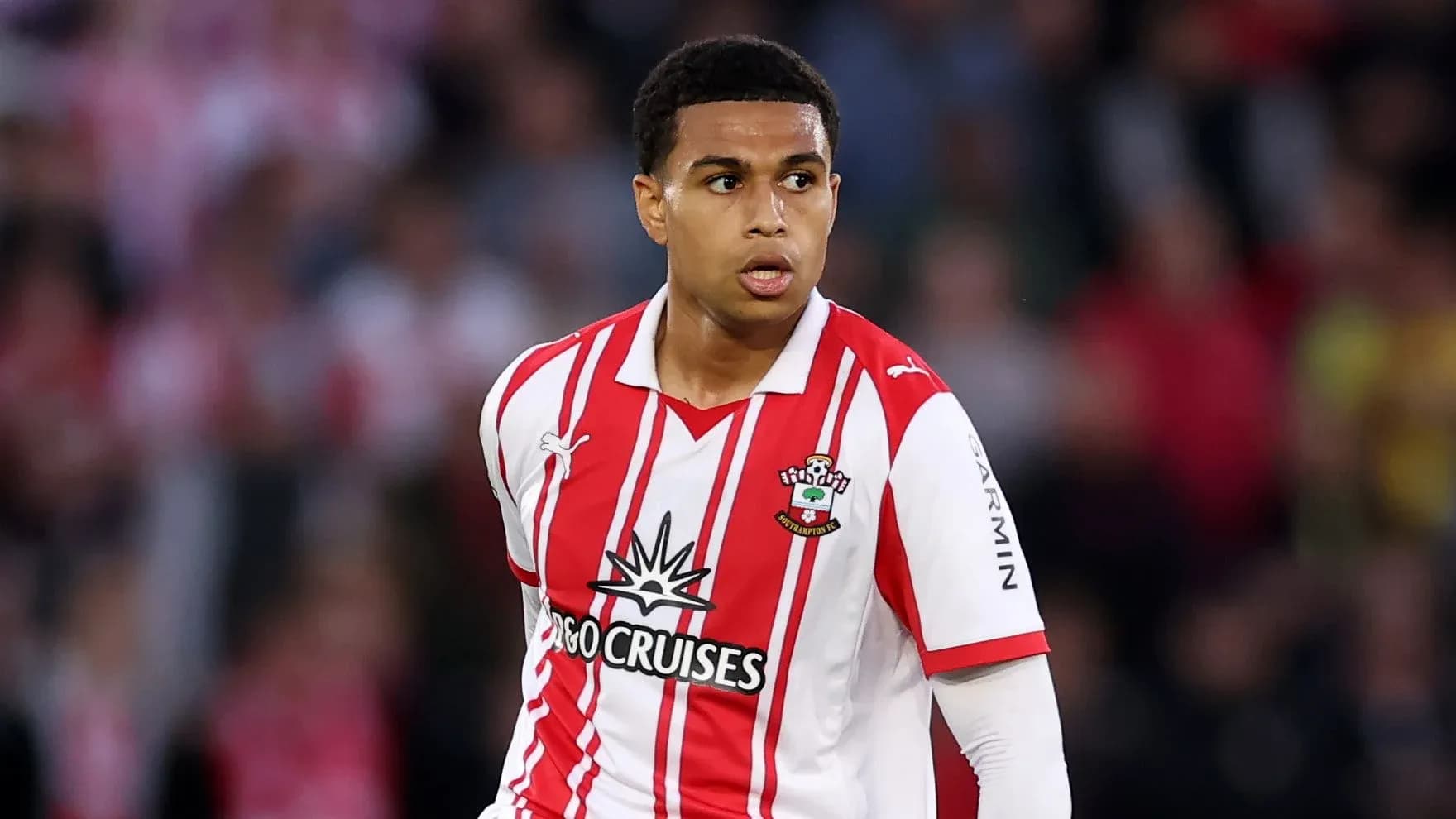 Player in Southampton FC kit during match action Player in Southampton FC kit during match action