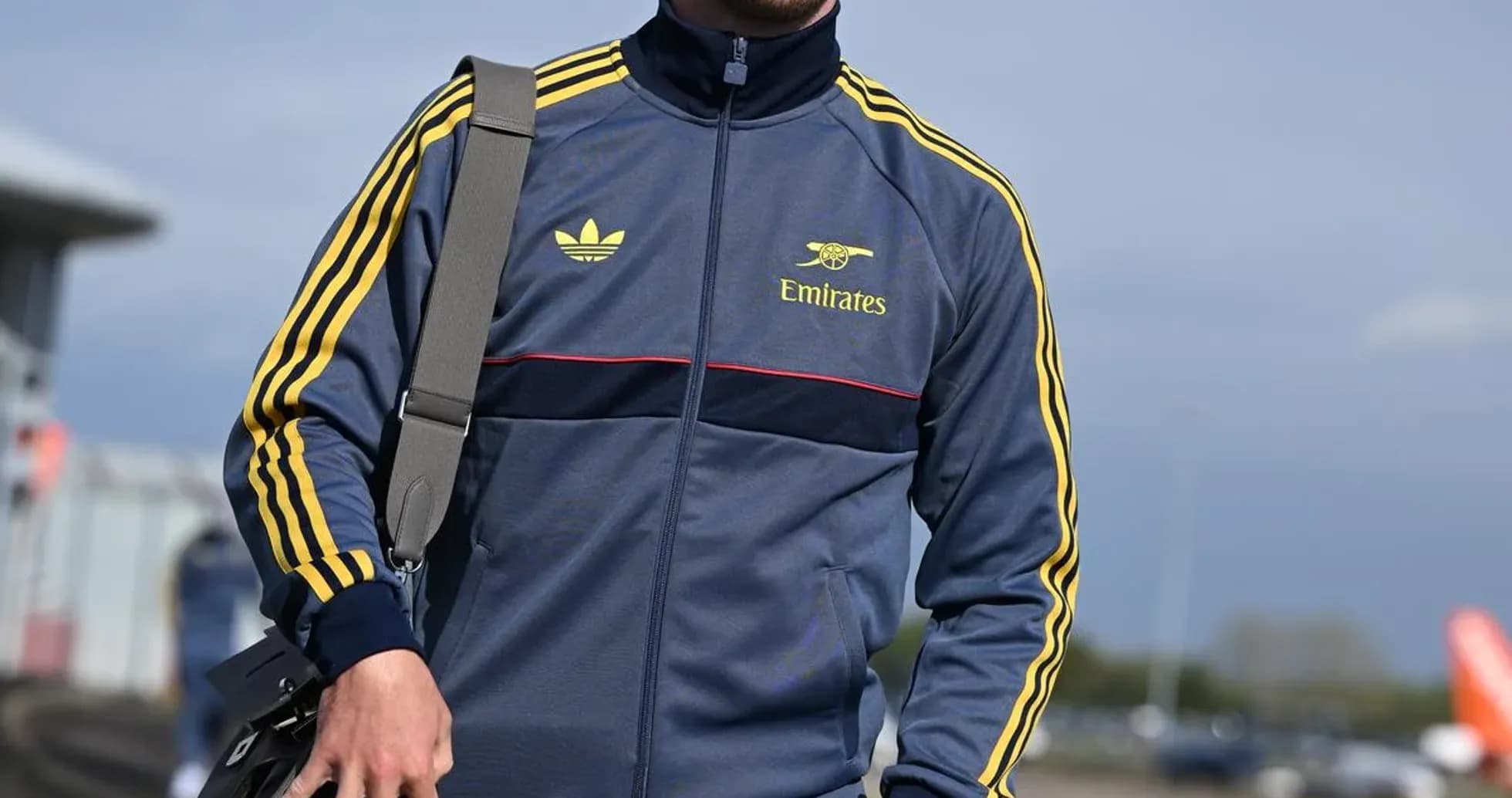 Man in sportswear walking with a bag Man in sportswear walking with a bag