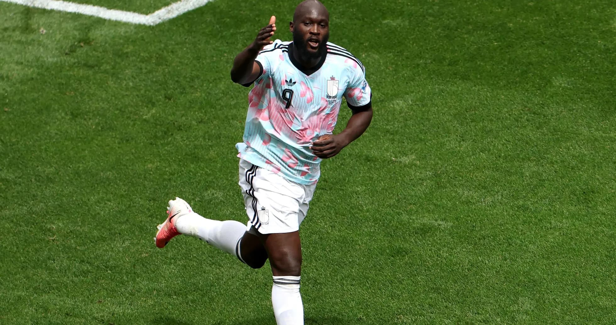 Player celebrating after scoring a goal on field Player celebrating after scoring a goal on field