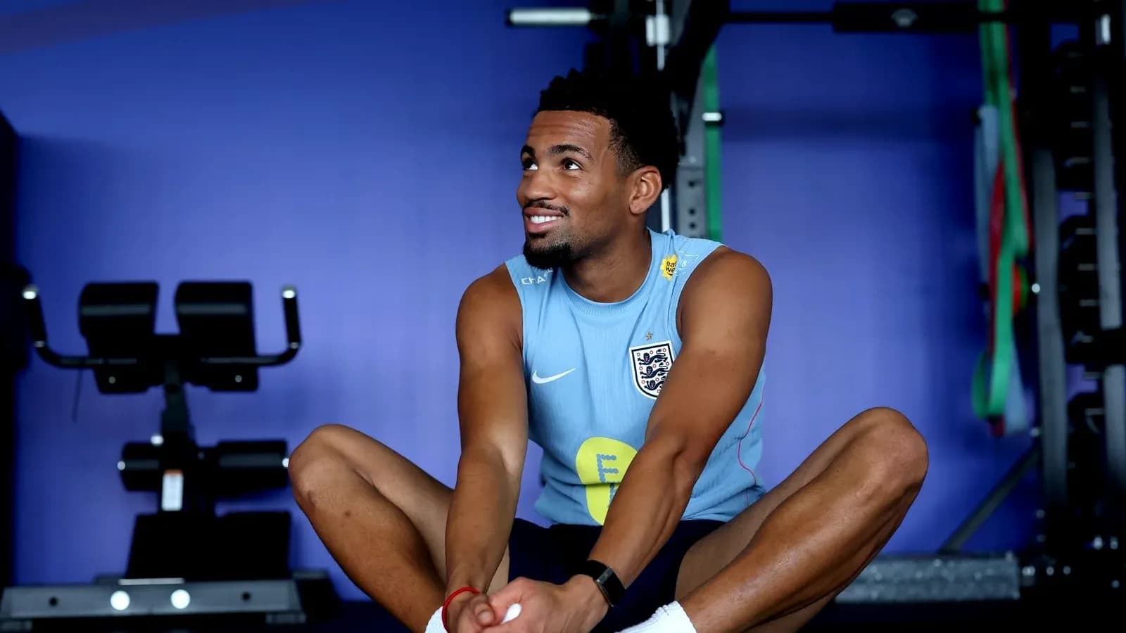 Player stretching in gym during training session Player stretching in gym during training session