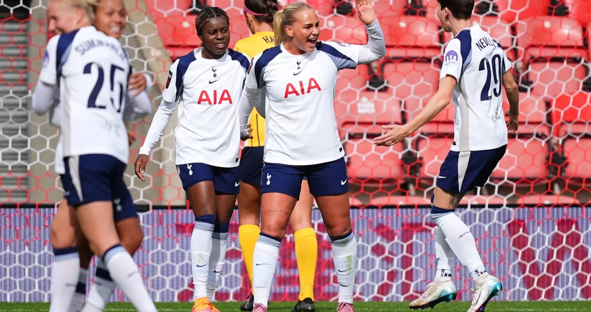Tottenham Hotspur W players celebrating a goal Tottenham Hotspur W players celebrating a goal
