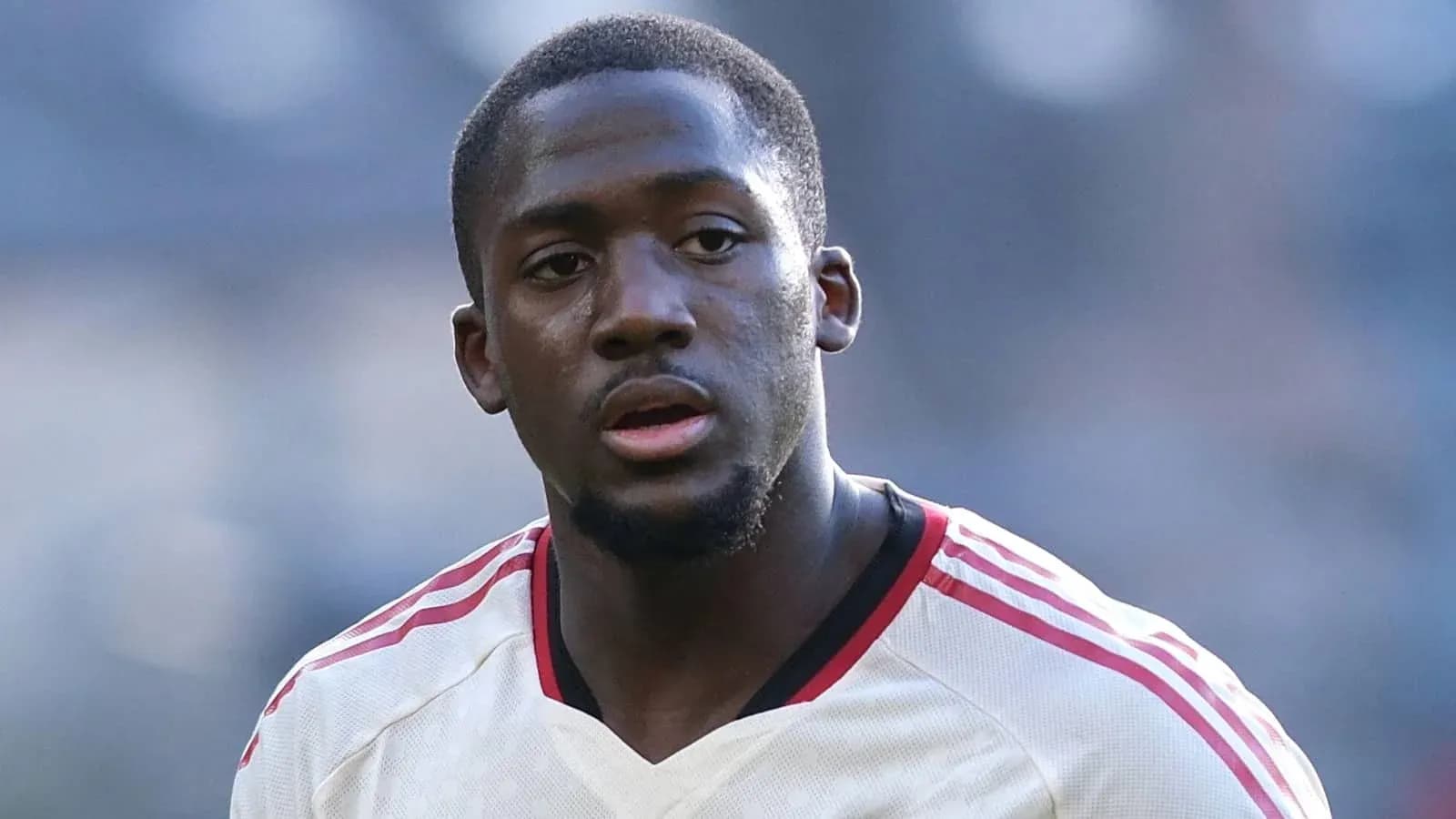 Player in white jersey during match Player in white jersey during match