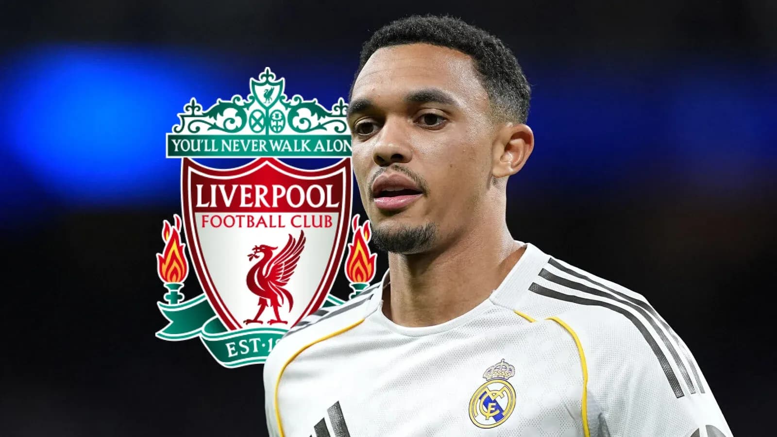 Player in white jersey with Liverpool logo background Player in white jersey with Liverpool logo background