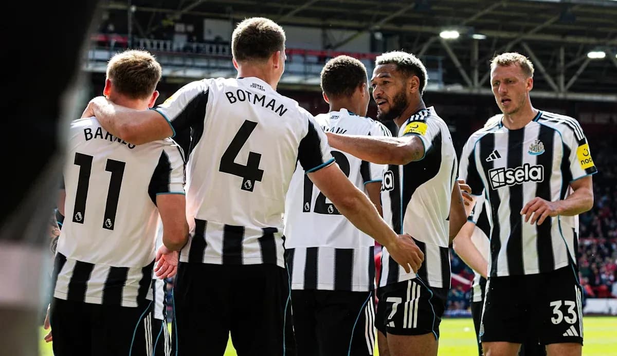 Newcastle United players celebrating a goal together Newcastle United players celebrating a goal together