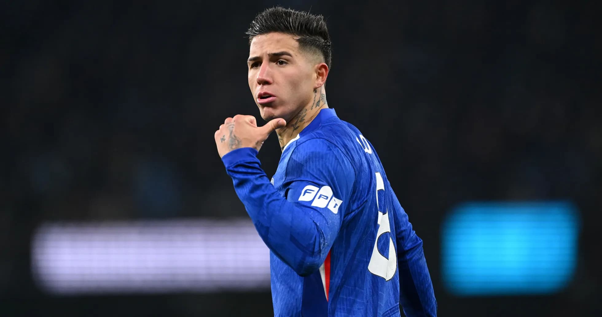 Player gesturing during football match on field Player gesturing during football match on field