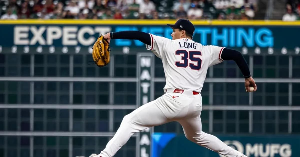 Pitcher throwing during a baseball game Pitcher throwing during a baseball game