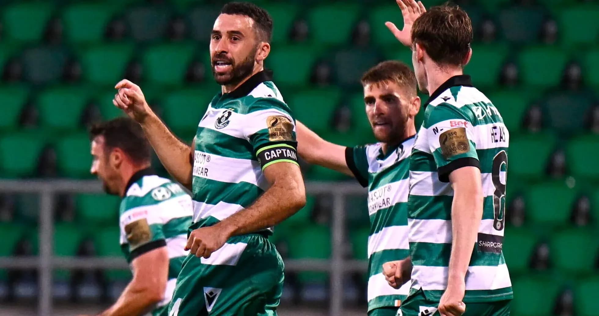 Shamrock Rovers players celebrating a goal Shamrock Rovers players celebrating a goal