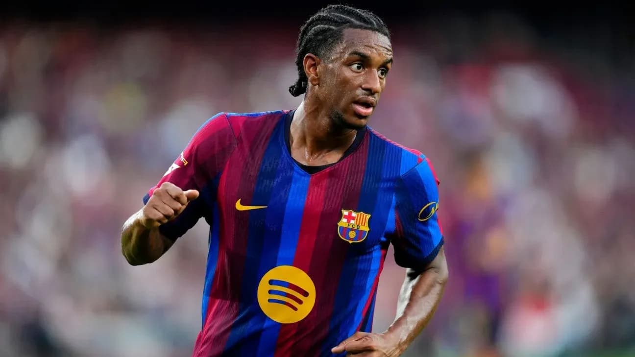 Football player wearing FC Barcelona jersey during match Football player wearing FC Barcelona jersey during match