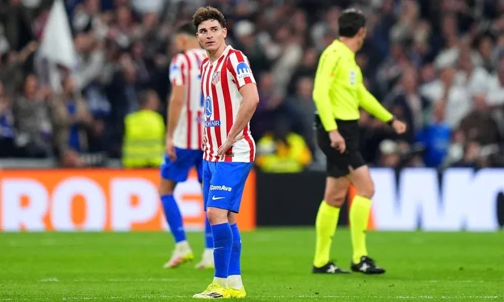 Atletico Madrid player looking concerned during match Atletico Madrid player looking concerned during match