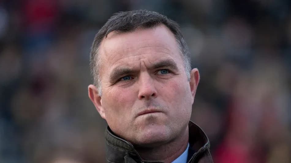 Man with serious expression in a crowd Man with serious expression in a crowd