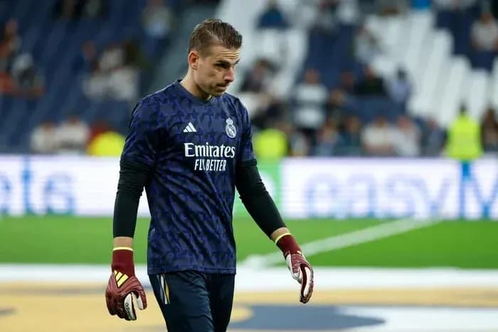 Goalkeeper walking on the pitch in Real Madrid kit Goalkeeper walking on the pitch in Real Madrid kit