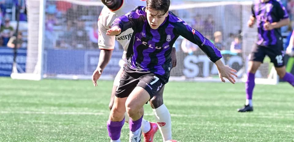 Pacific FC player dribbling during match Pacific FC player dribbling during match