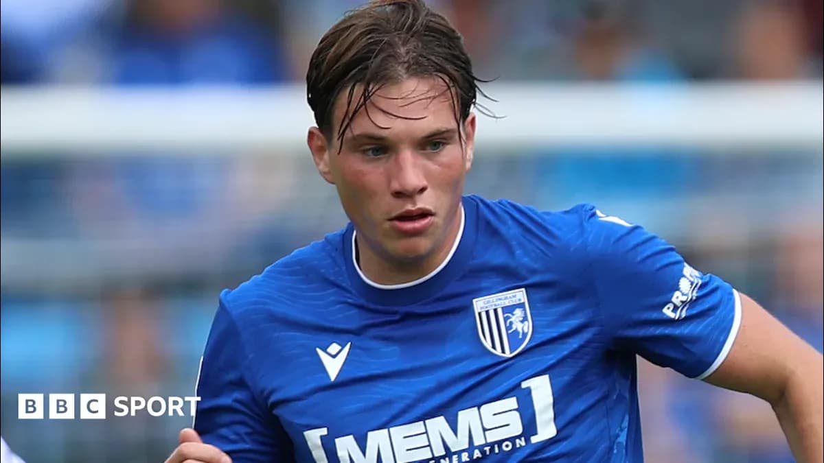 Gillingham player running during a match Gillingham player running during a match