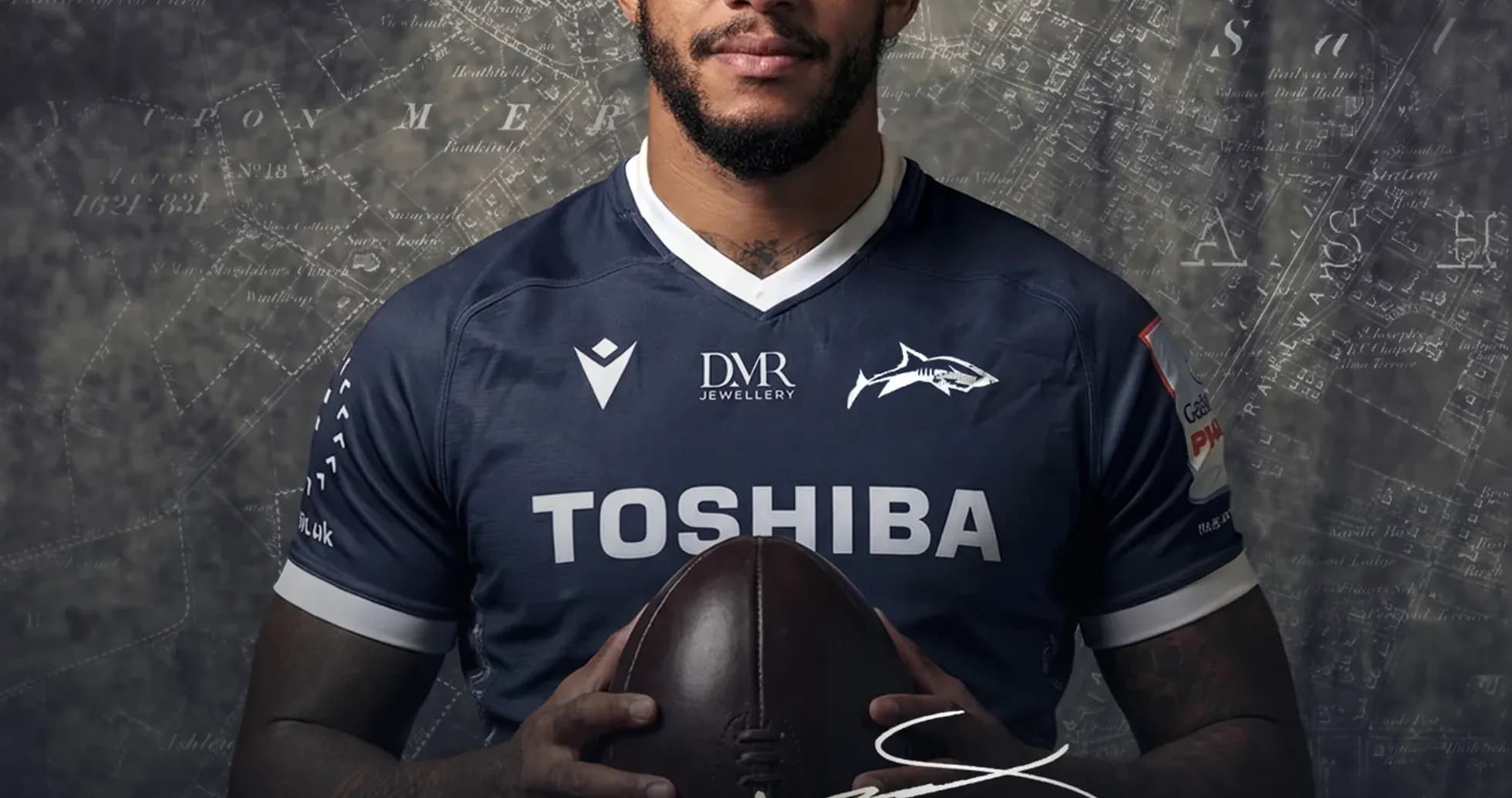 Courtney Lawes holding a rugby ball in jersey Courtney Lawes holding a rugby ball in jersey