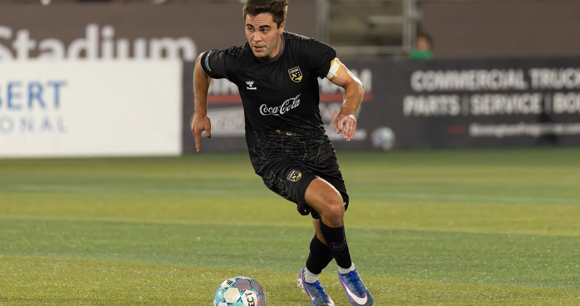Player dribbling the ball during match Player dribbling the ball during match