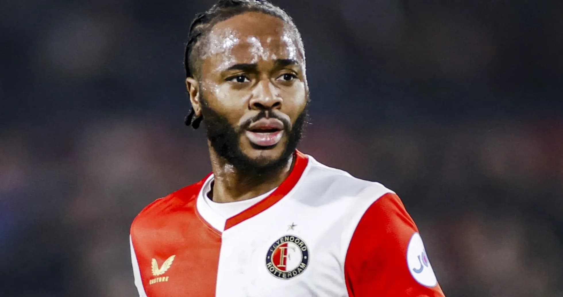 Player wearing Feyenoord jersey during match action Player wearing Feyenoord jersey during match action