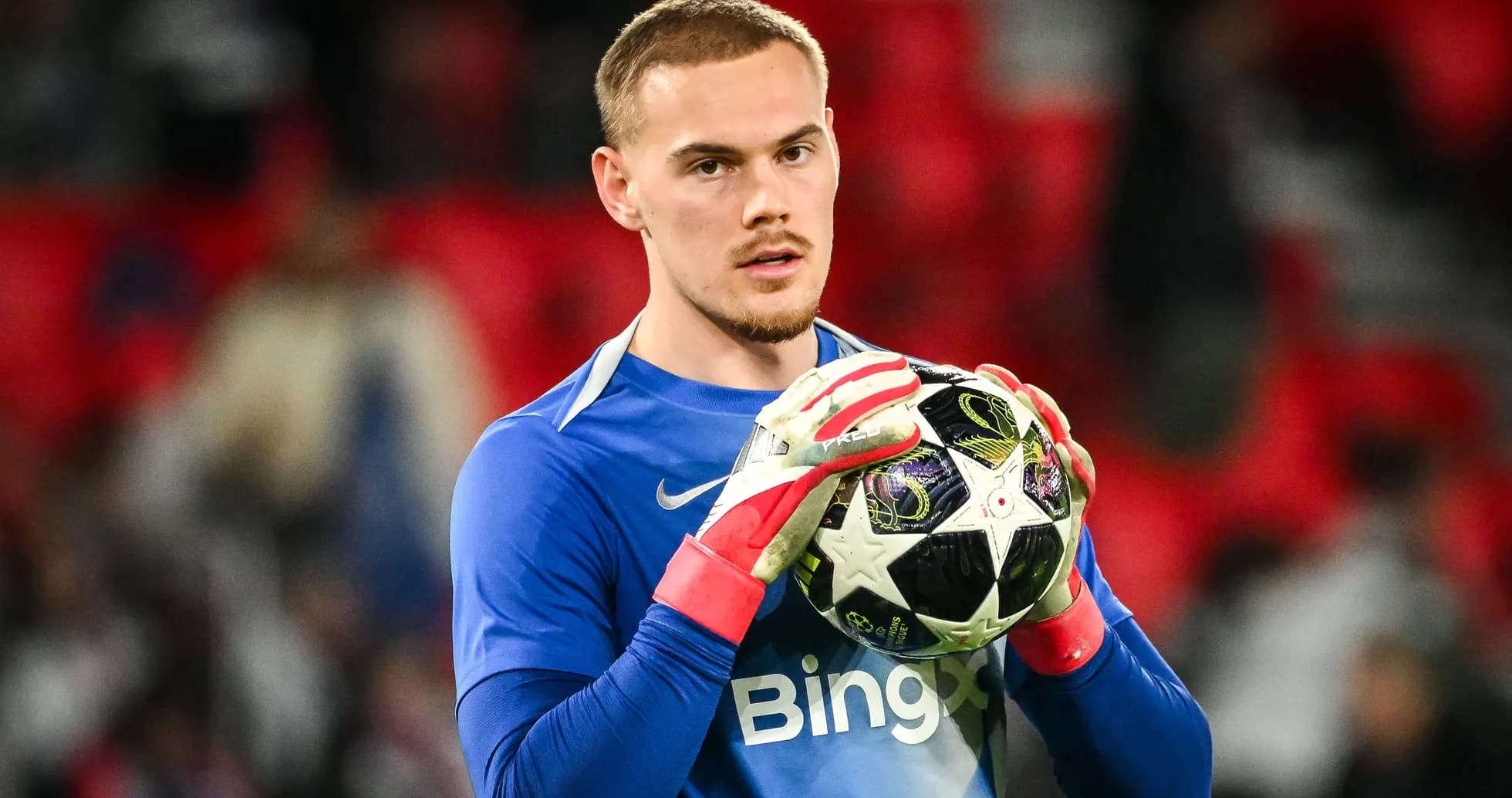 Goalkeeper holding a ball before the match Goalkeeper holding a ball before the match