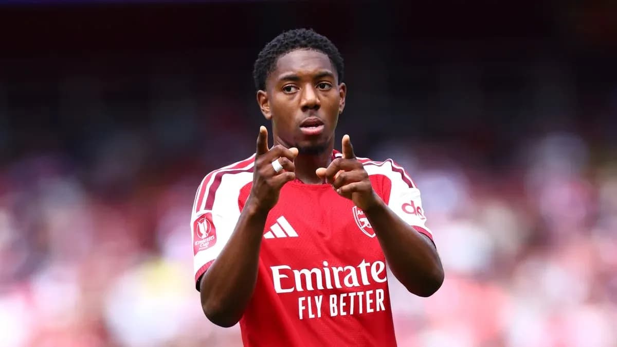 Player gesturing on the pitch during match Player gesturing on the pitch during match
