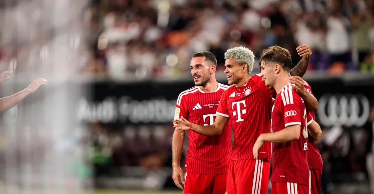 Bayern Munich players celebrating a goal together Bayern Munich players celebrating a goal together