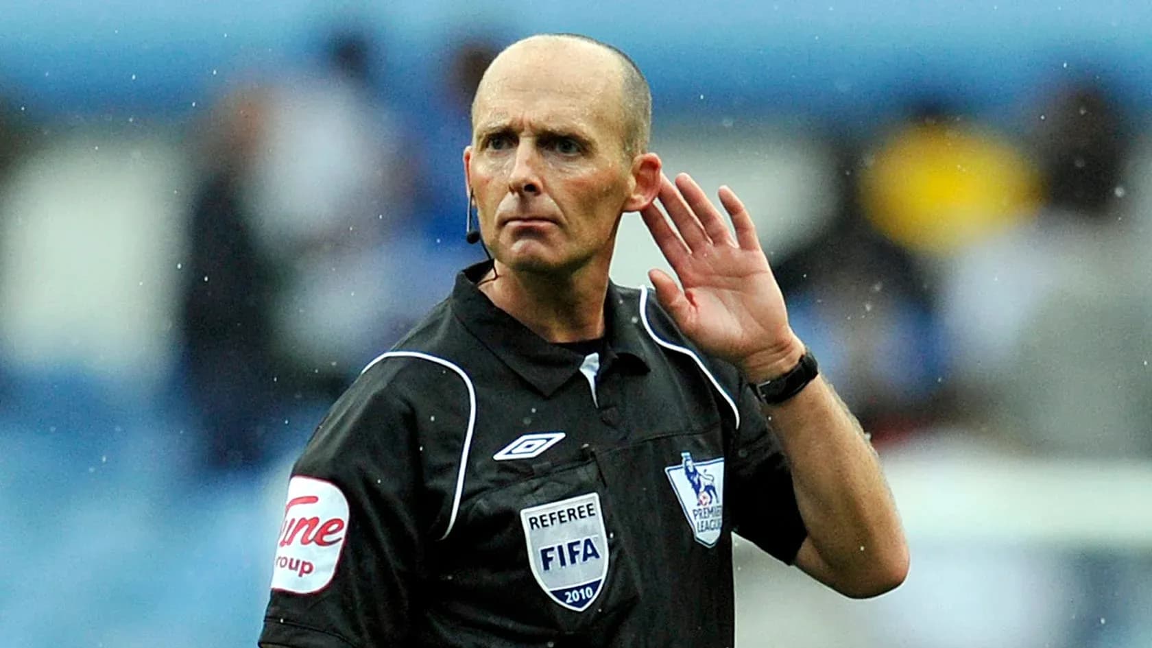 Referee signaling during a football match Referee signaling during a football match