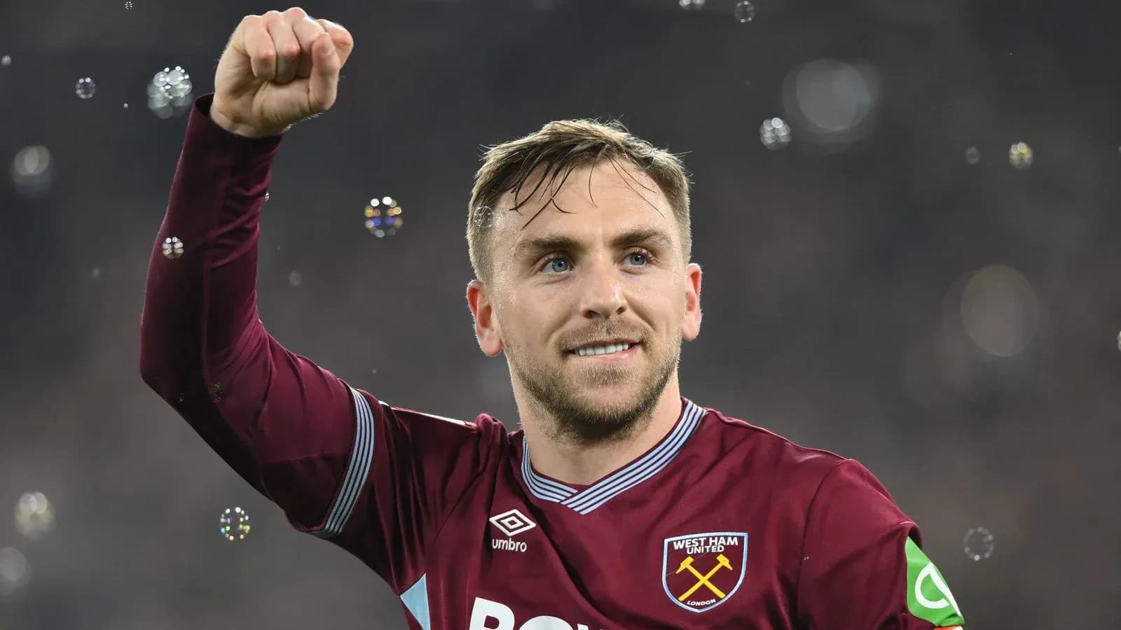 West Ham player celebrating with raised fist West Ham player celebrating with raised fist