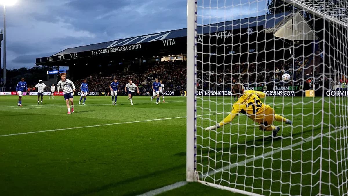 Player taking a penalty kick during match Player taking a penalty kick during match