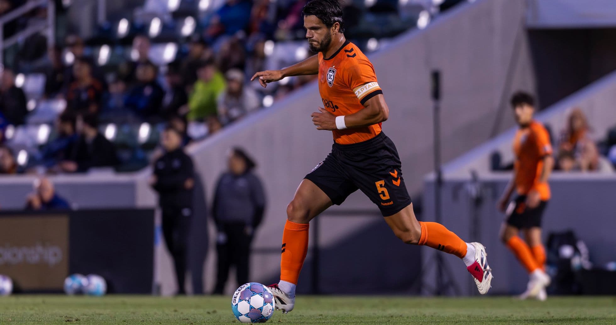 Player dribbling the ball during match Player dribbling the ball during match