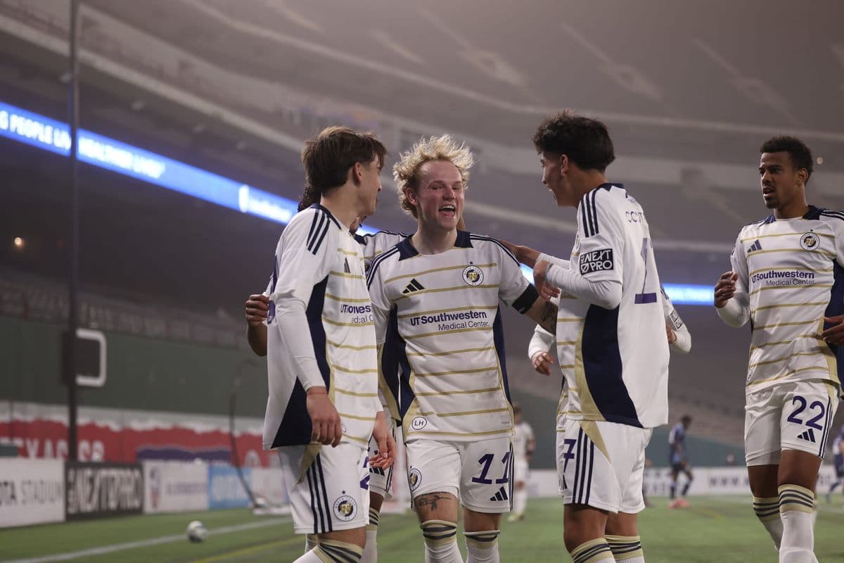 Players celebrating a goal during match Players celebrating a goal during match