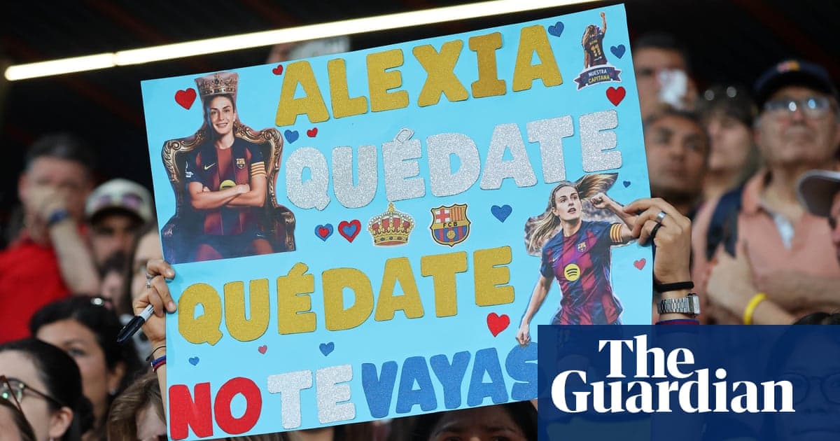 Fan holding sign supporting player Alexia at match Fan holding sign supporting player Alexia at match
