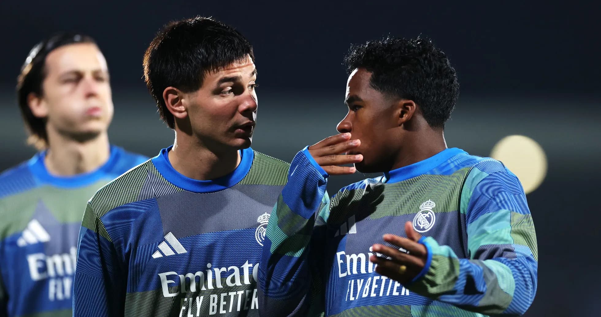 Two Real Madrid players talking during training session Two Real Madrid players talking during training session