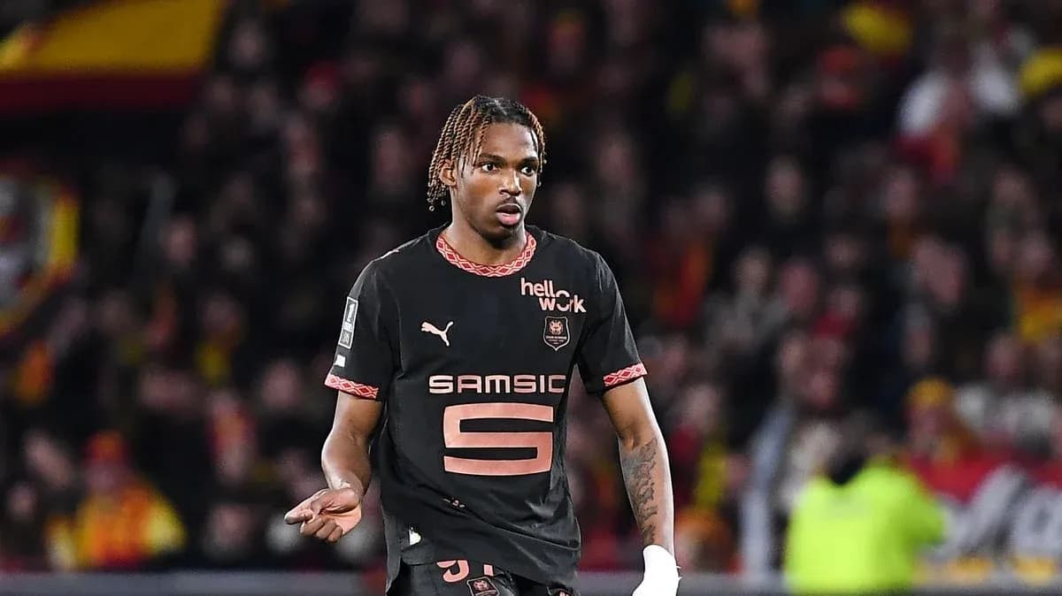 Player in black jersey during football match Player in black jersey during football match