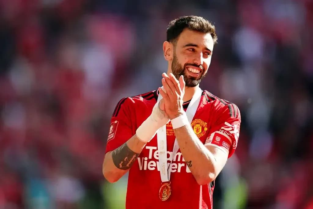 Player celebrating with medal after match Player celebrating with medal after match
