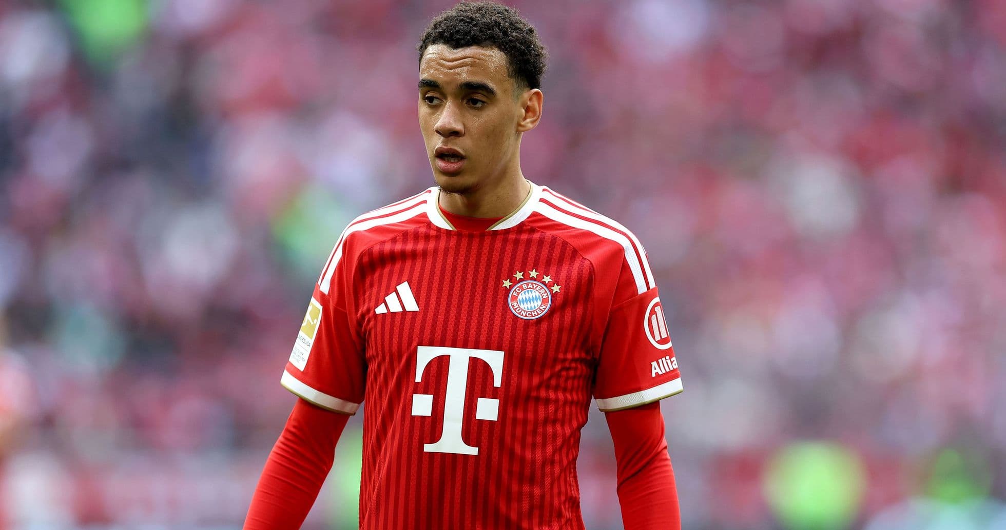 Player in Bayern Munich jersey on the field Player in Bayern Munich jersey on the field