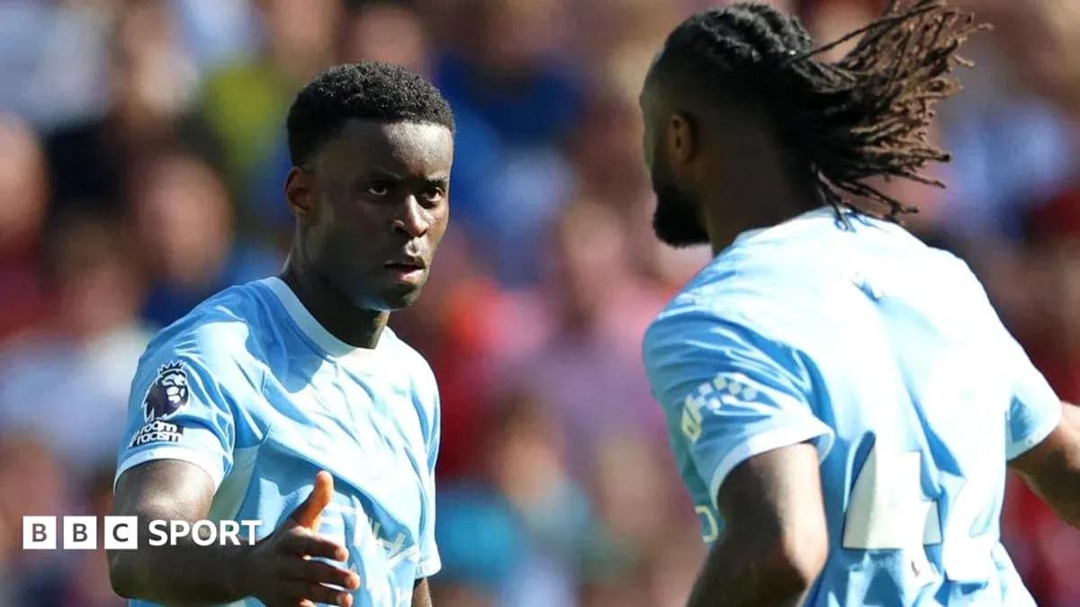 Two players discussing during a football match Two players discussing during a football match