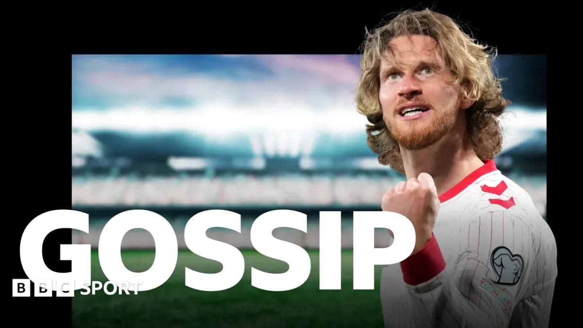 Player celebrating with raised fist in stadium Player celebrating with raised fist in stadium