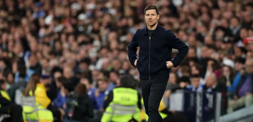 Coach walking on the sideline during a match Coach walking on the sideline during a match