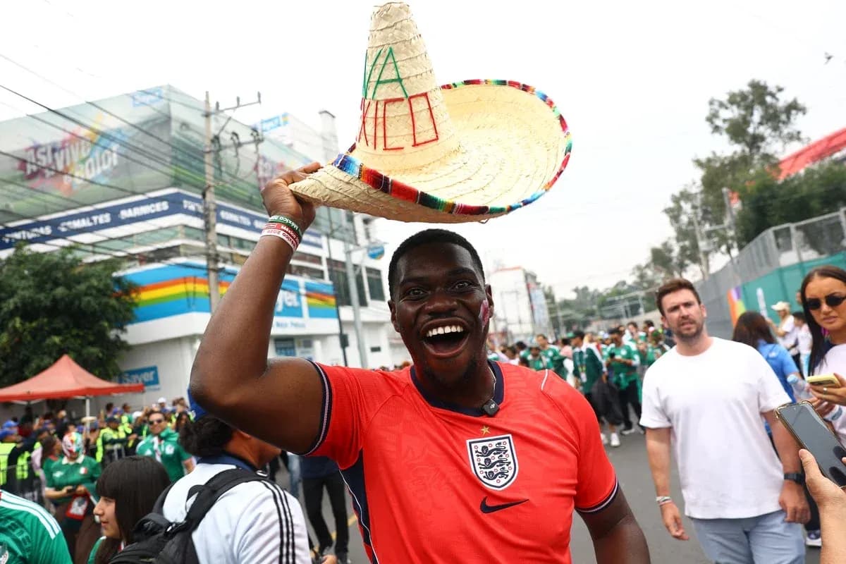 Fan in England jersey celebrating with sombrero Fan in England jersey celebrating with sombrero