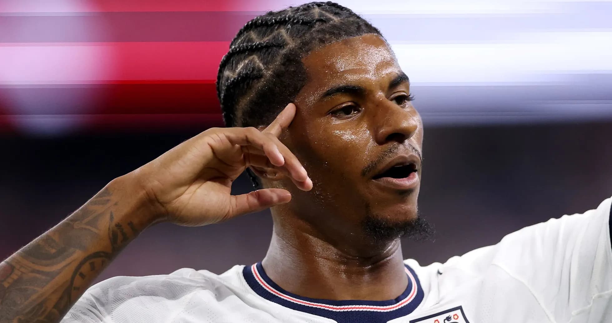 Player celebrating a goal during a match Player celebrating a goal during a match